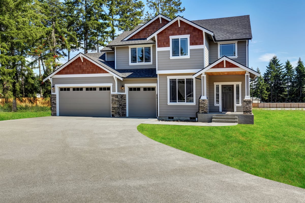 A well-maintained craftsman house with a front porch and lawn — the kind of property a shared-housing operator would seek to control